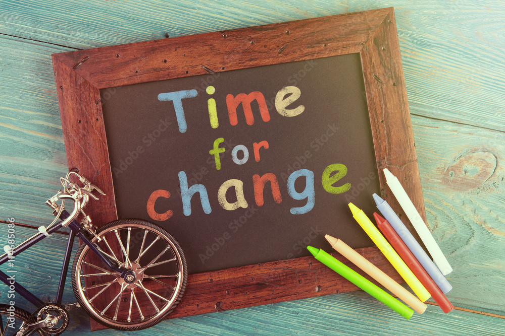 Time for change - written with crayons on the chalkboard