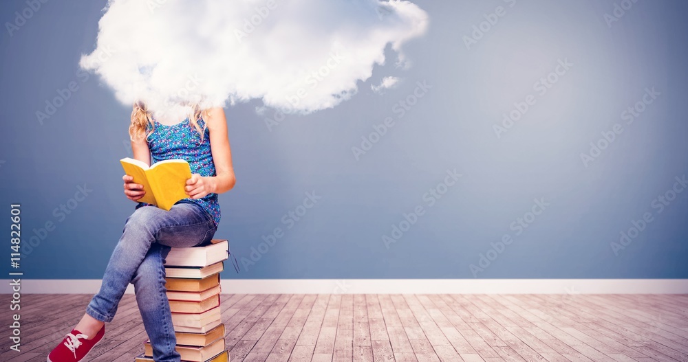 Composite image of cute little girl reading book in library