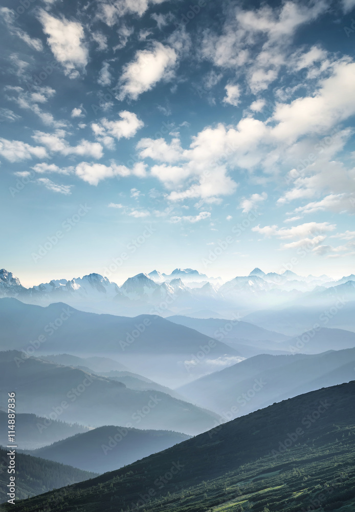 Hills during sunrise in mountain valley. Beautisul natural landscape