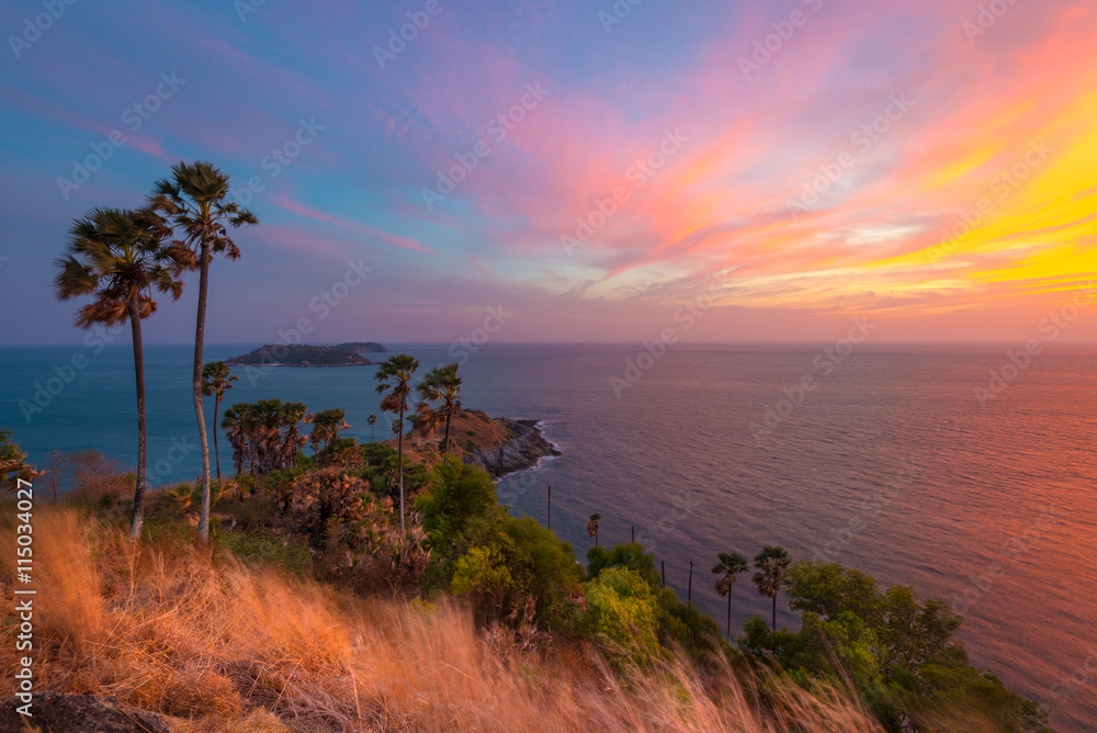 Sunset with wonderful twilight at Phromthep Cape in phuket island, Thailand.