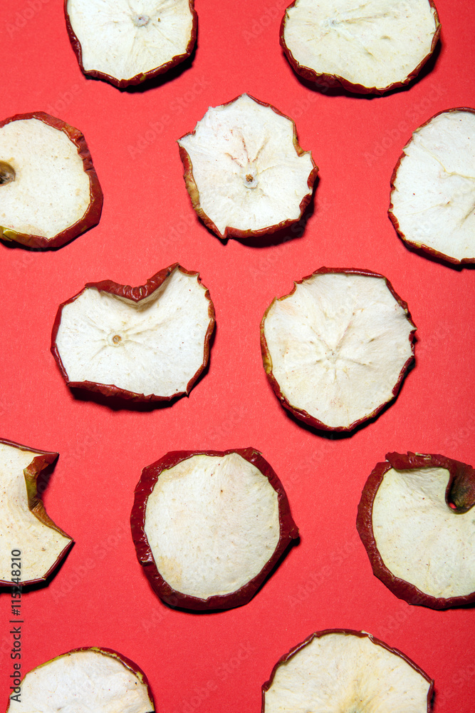 Colorful fruit pattern made of dried apples slices