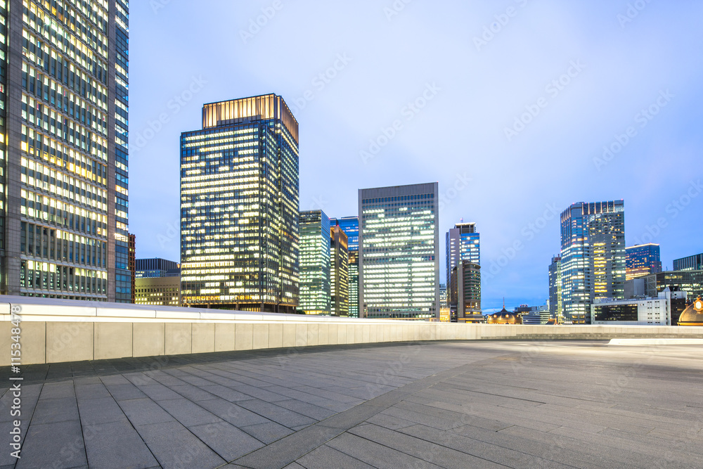 modern office buildings in downtown of tokyo at twilight