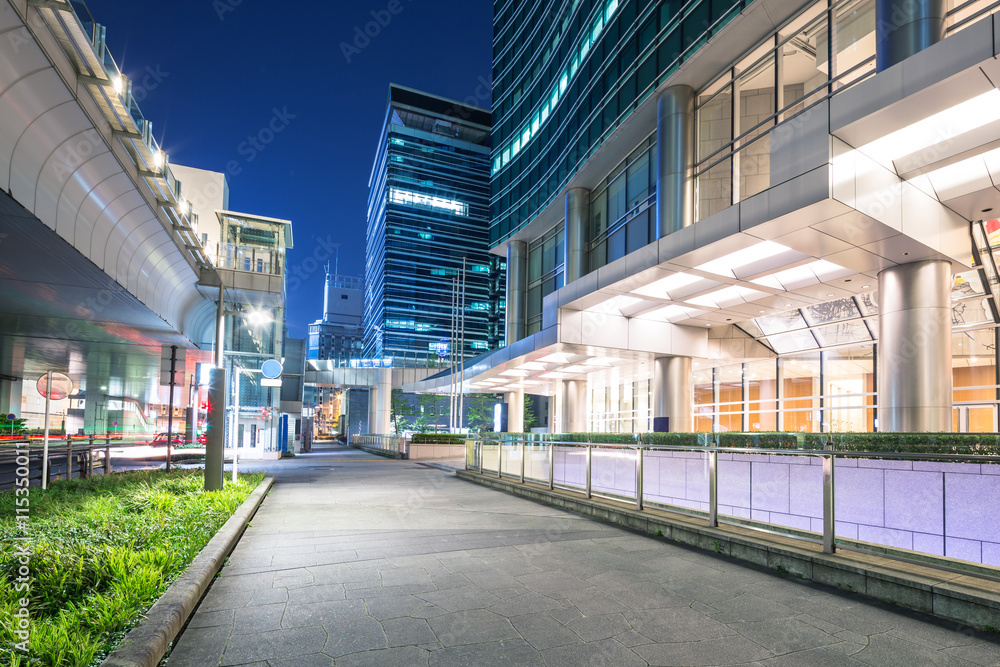 modern office buildings in downtown of tokyo at twilight