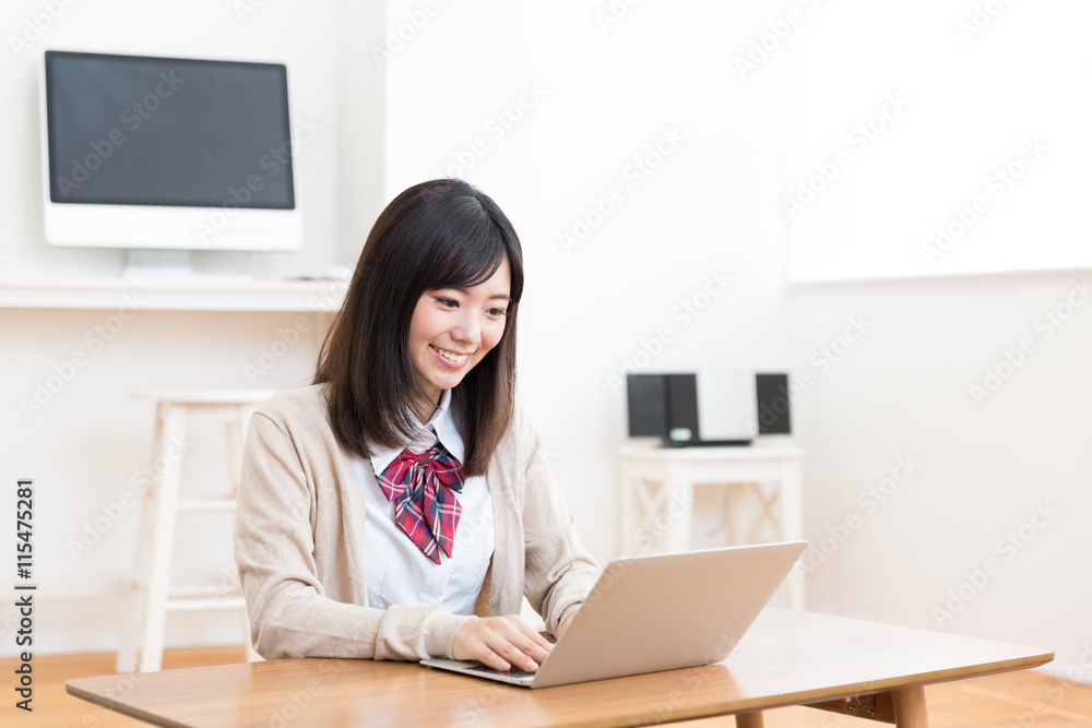 portrait of asian schoolgirl in the room