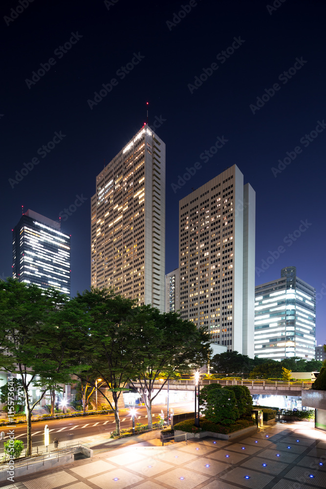 modern office buildings in downtown of tokyo at night