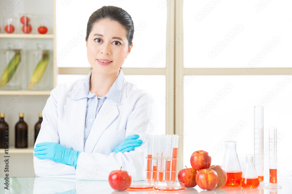 Asian female scientist looking for cure for genetic modification