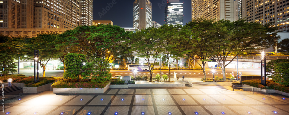 modern office buildings in downtown of tokyo at night