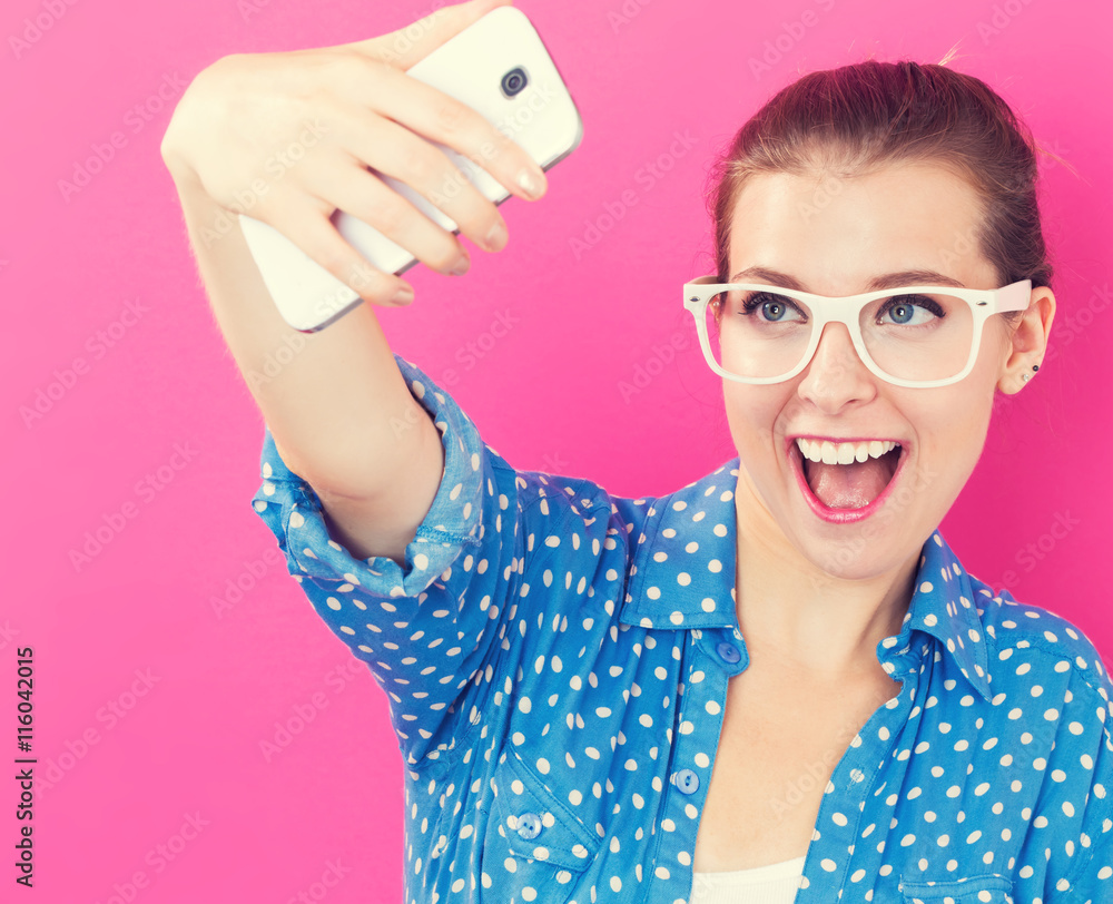 Young woman taking a selfie