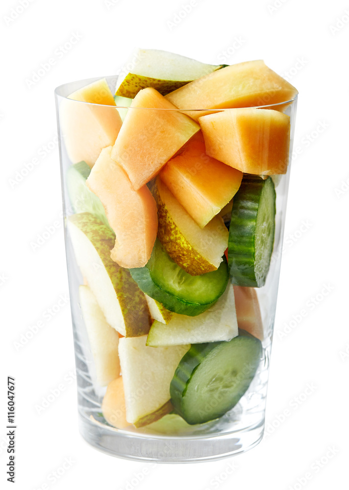 glass of fruit and vegetable pieces