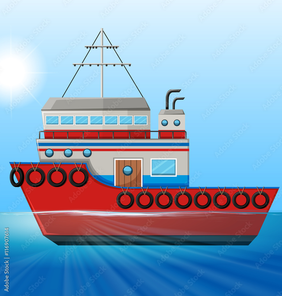 Tugboat floating in the ocean