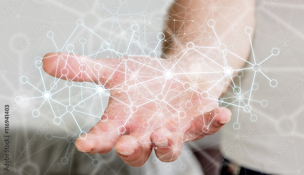 Businessman using data network with his hand