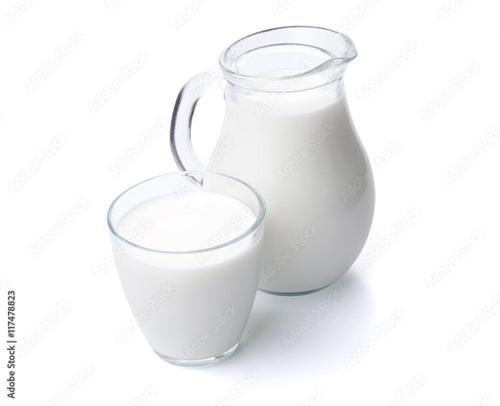 Milk in a glass jug isolated with clipping path.