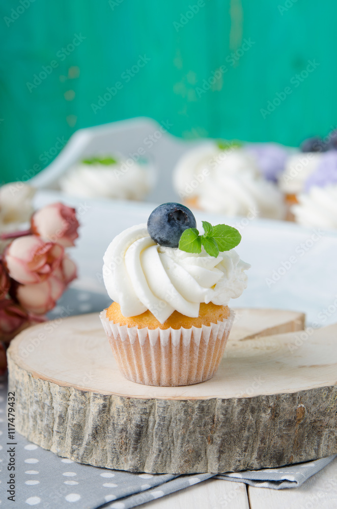 Summer cupcakes with blueberries and mint flavoured cream. Homemade.