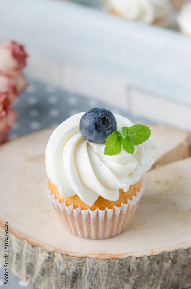 Summer cupcakes with blueberries and mint flavoured cream. Homemade.