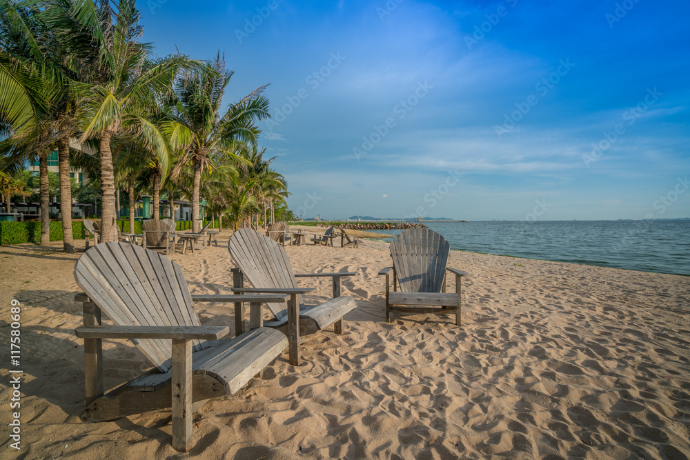 Wooden chair on a sunny beach.