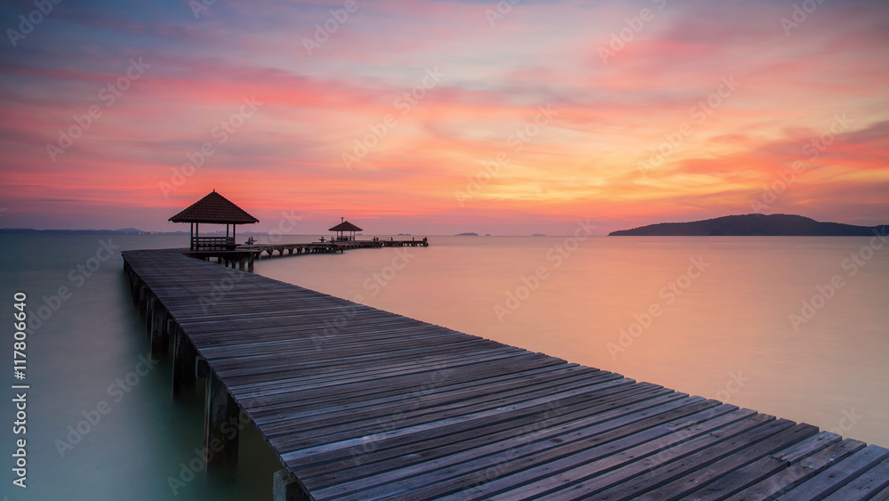 Wooden pier between sunset in Phuket