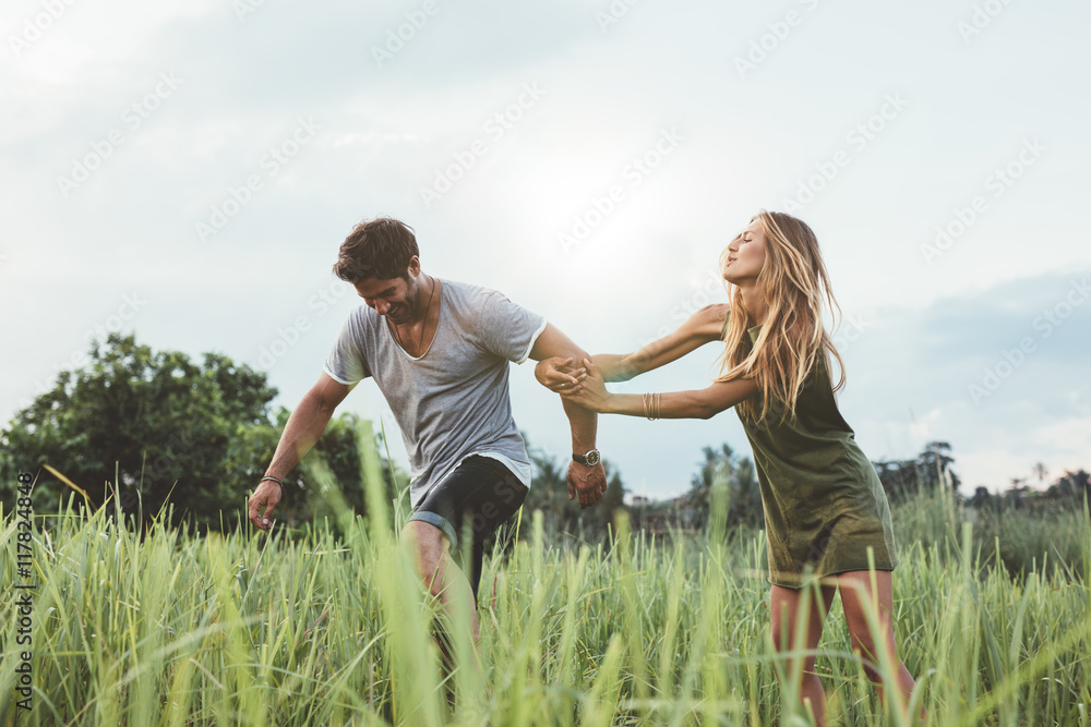 Happy young couple enjoying a day in nature