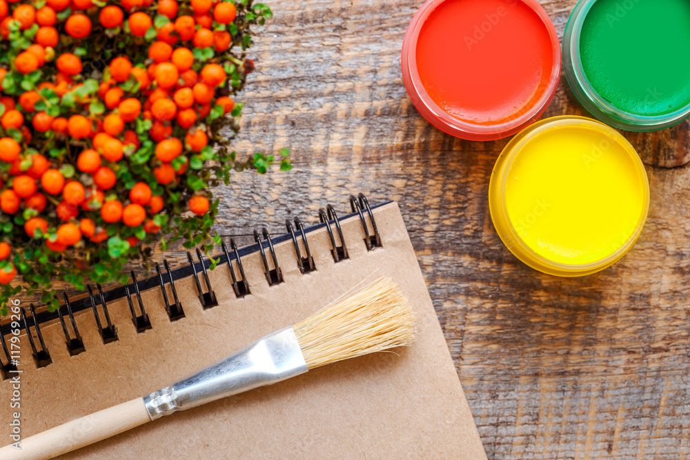 hobby painting - workplace with colored pencils, gouache jars