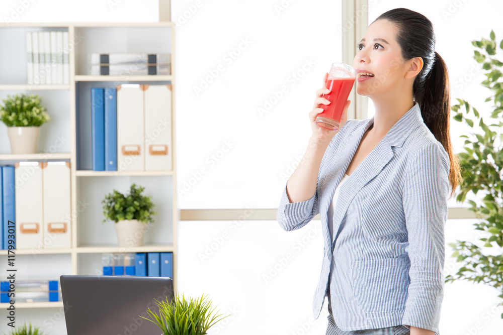 asian business woman drinking fresh watermelon juice