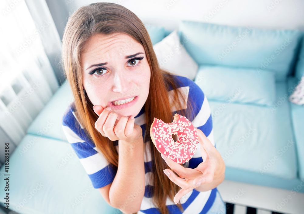 Woman on diet caught during eating donut