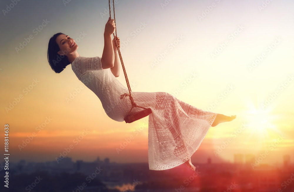 young woman on a swing