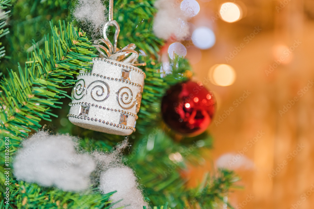 Decorated Christmas tree on blurred, sparkling