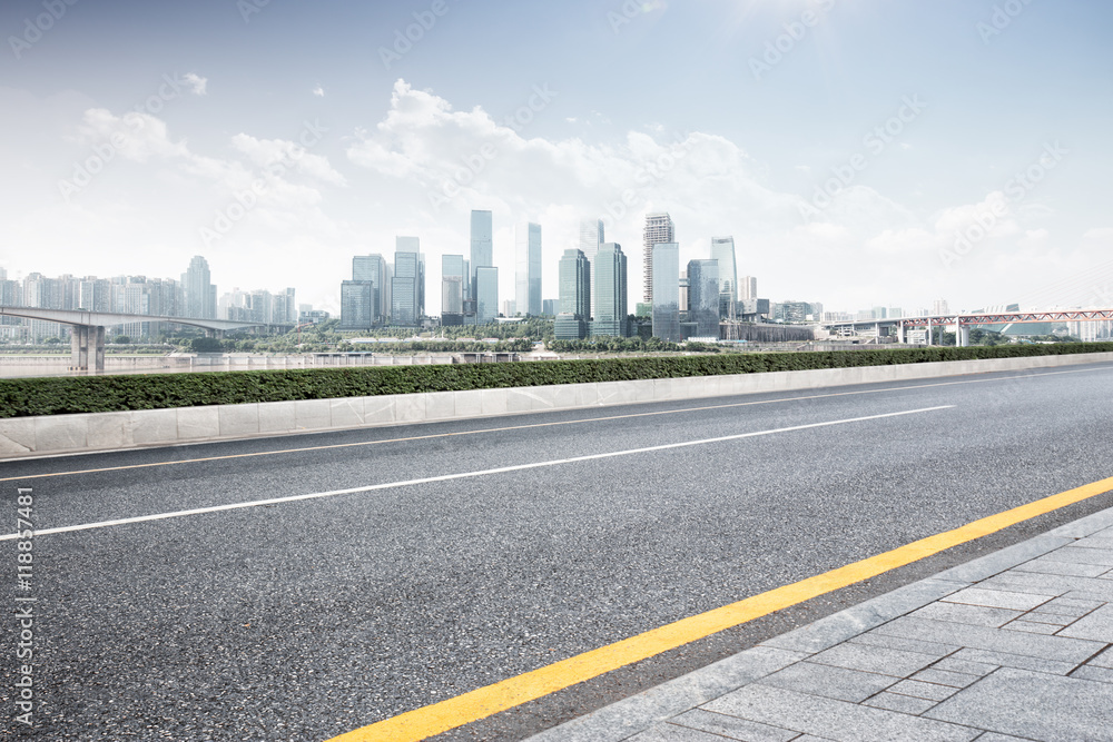 cityscape and skyline of guangzhou from empty asphalt road