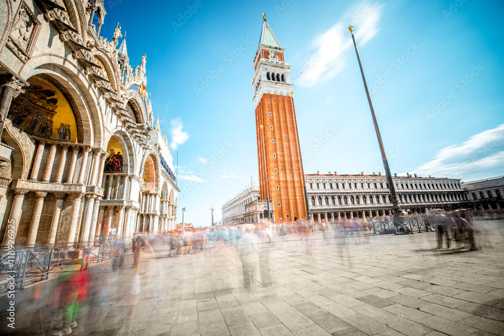 Saint Marks square with campanille and basilica in Venice. Long exposure image technic with motion 