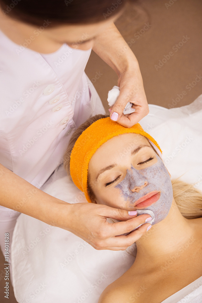 Woman applying mask