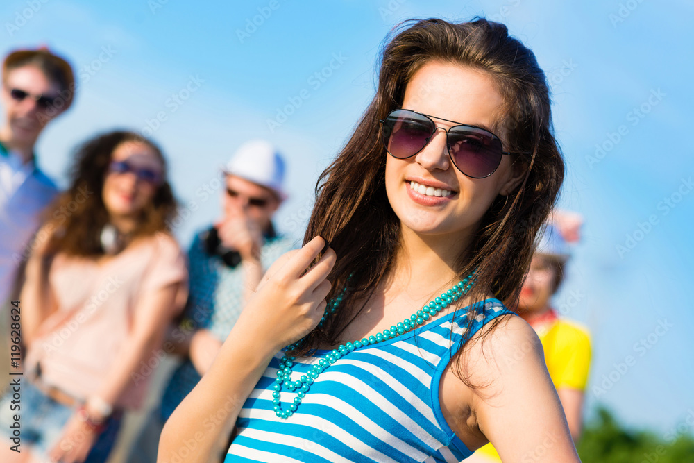 stylish young woman in sunglasses