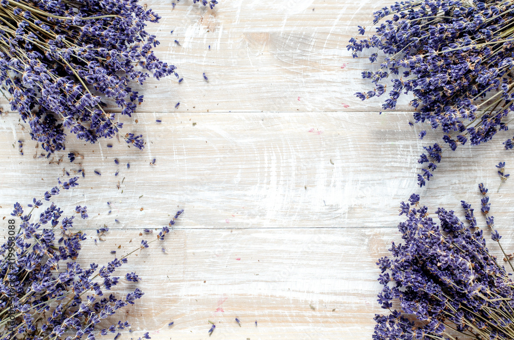 bouquets of lavender on a wooden table top view