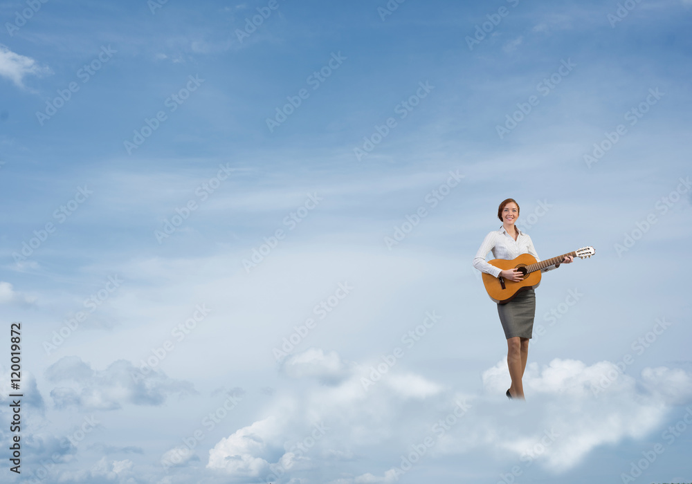 Businesswoman play guitar