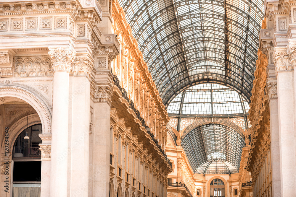 Architecture of the famous Vittorio Emanuele shopping gallery in the center of Milan city.