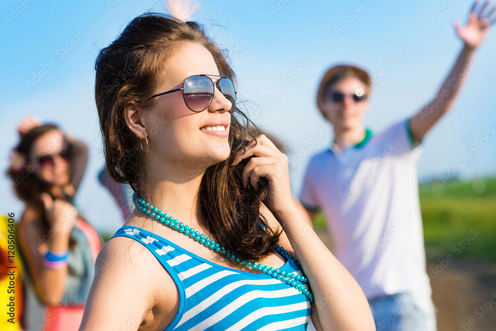 stylish young woman in sunglasses