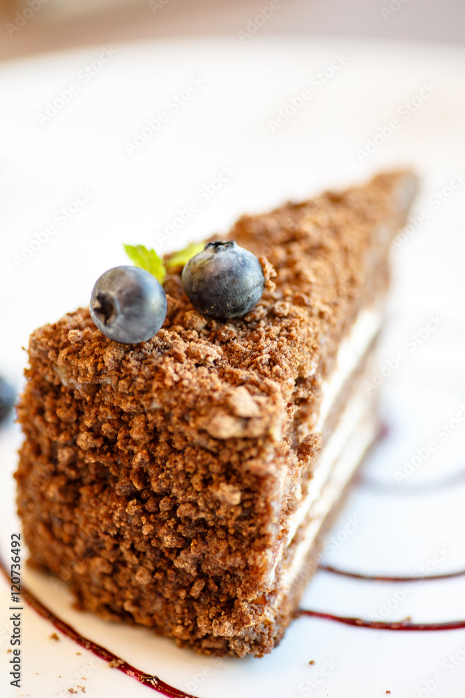 Coffee layer cake with blueberries and mint.