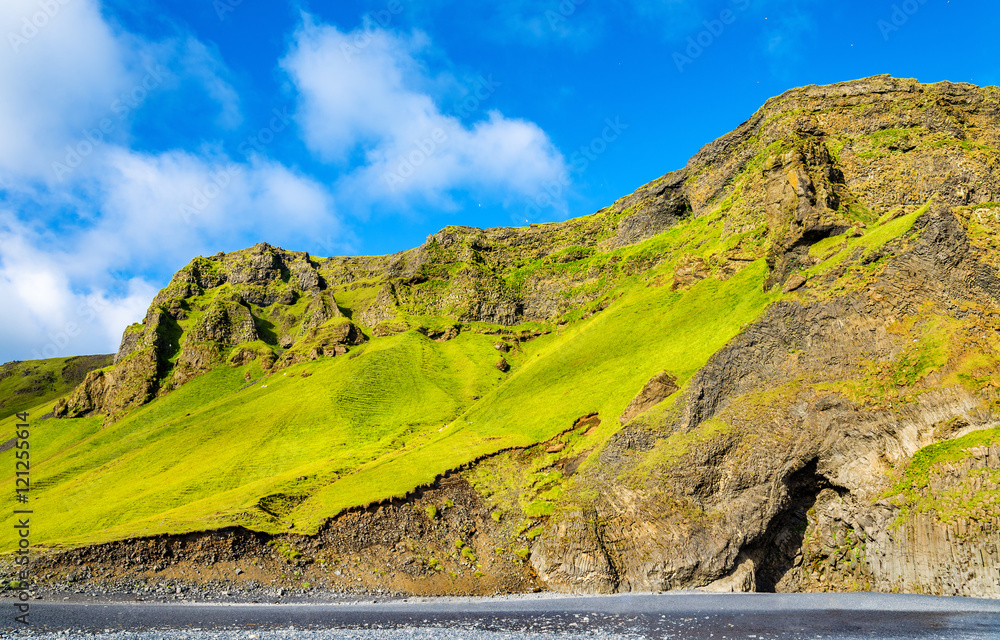 Reynisfjall Mountain at the black sand beach of Reynisfjara - Iceland