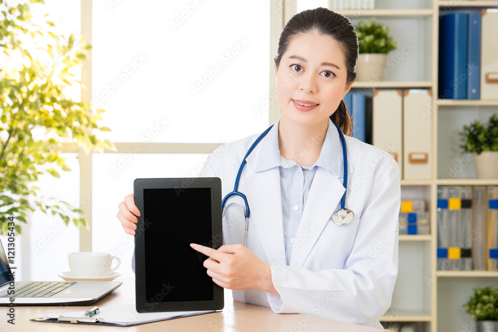 doctor using digital tablet to show patients medical case