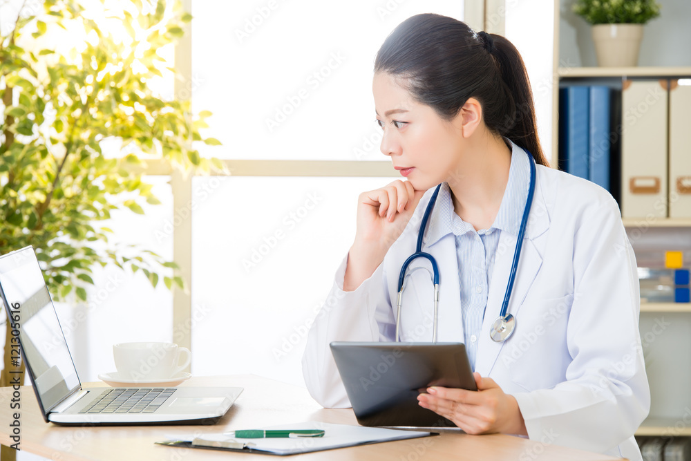 doctor drink coffee using digital tablet research patients medi