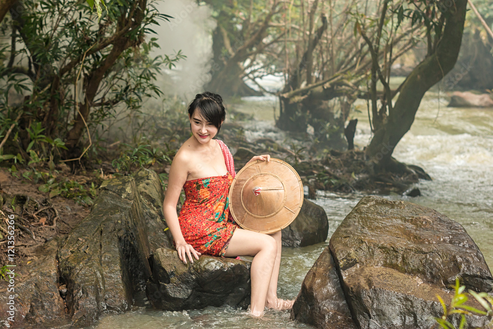 Young people are bathing in waterfall at rural,Thailand.