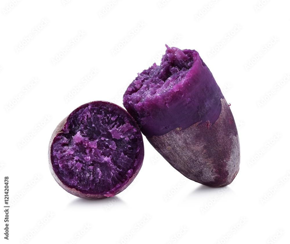 Ripe sweet purple potatoes on white background