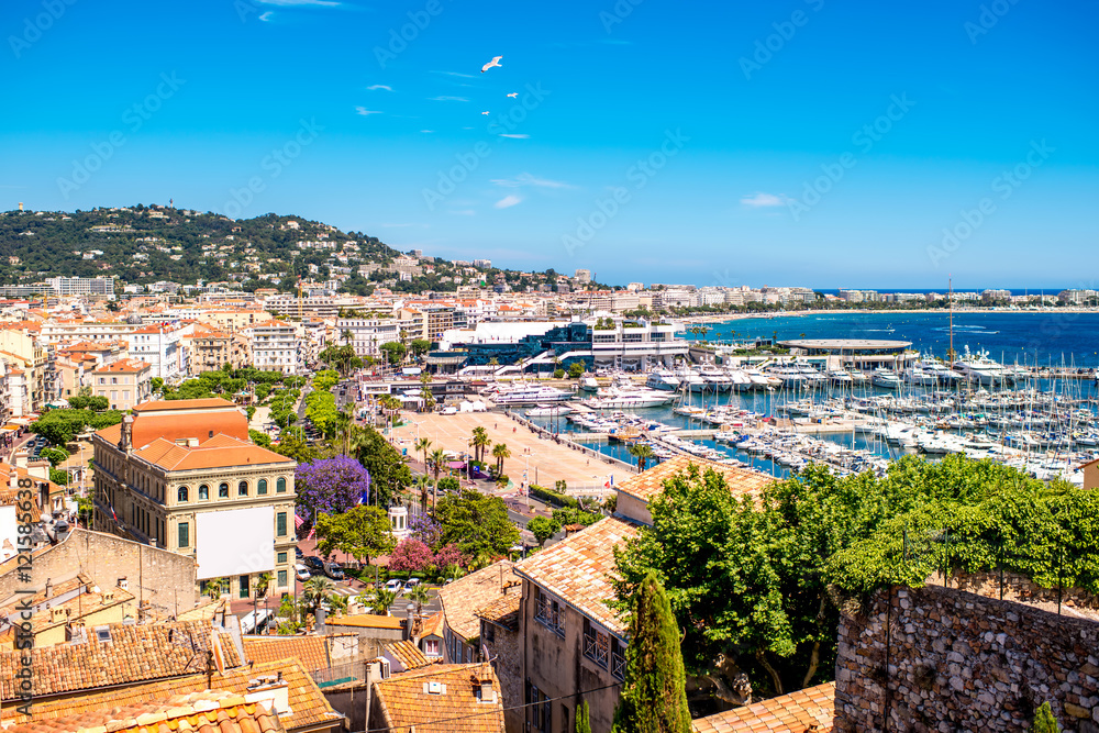 Top cityscape view on french riviera with yachts in Cannes city