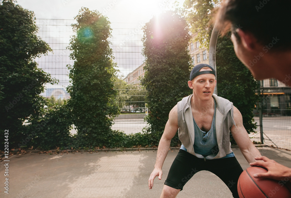 Two streetball players on the basketball court