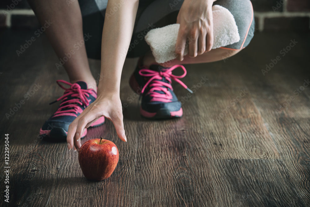 pick up apple and listen to music, fitness exercise training