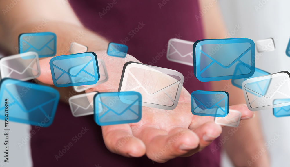 Businessman holding digital email icons ‘3D rendering’