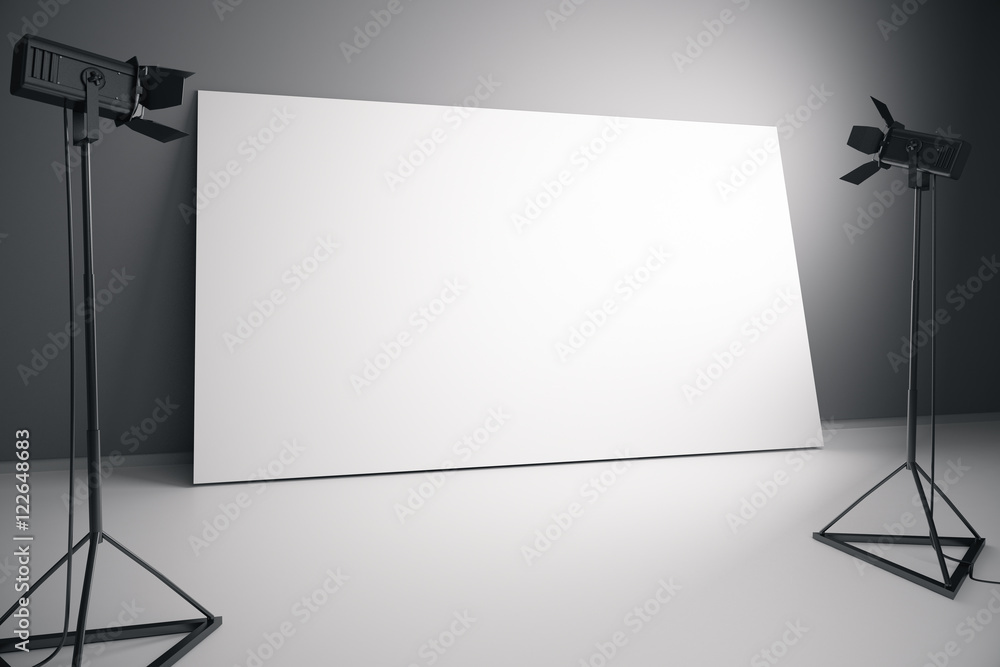 Blank white billboard with professional lighting