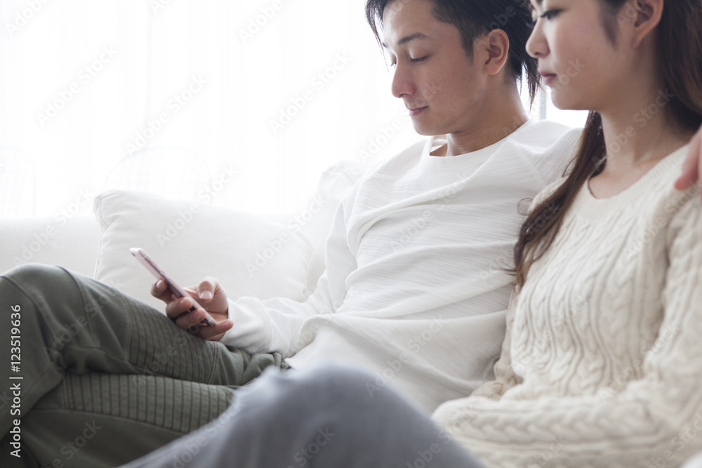 Young couple are relaxing in the living room