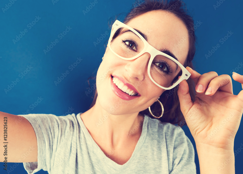 Young woman taking a selfie