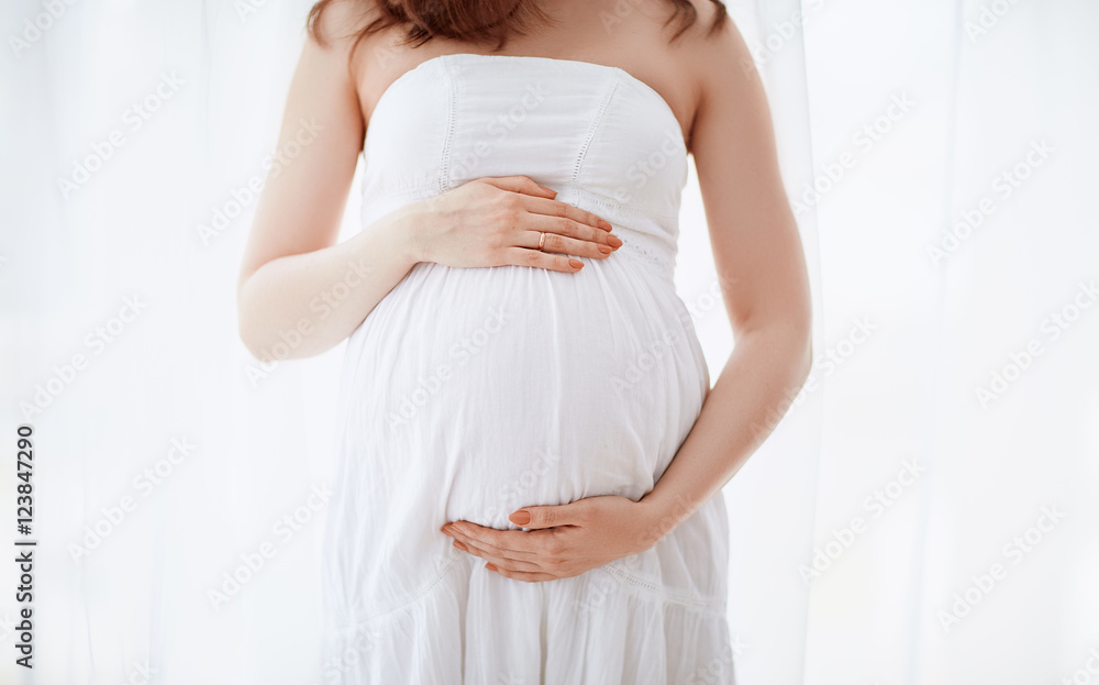 belly of a pregnant woman