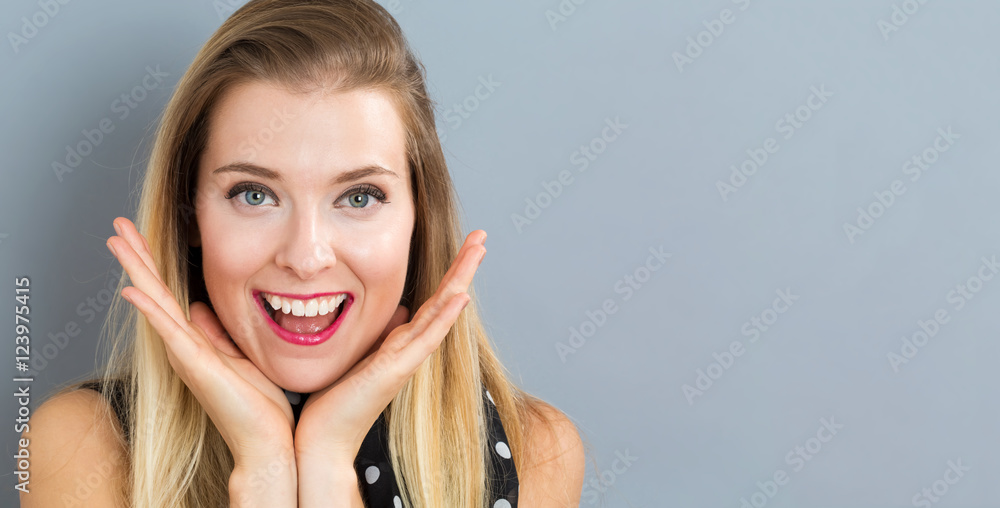 Surprised young woman posing