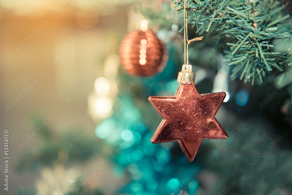 Decorated Christmas tree on blurred, sparkling and fairy backgro